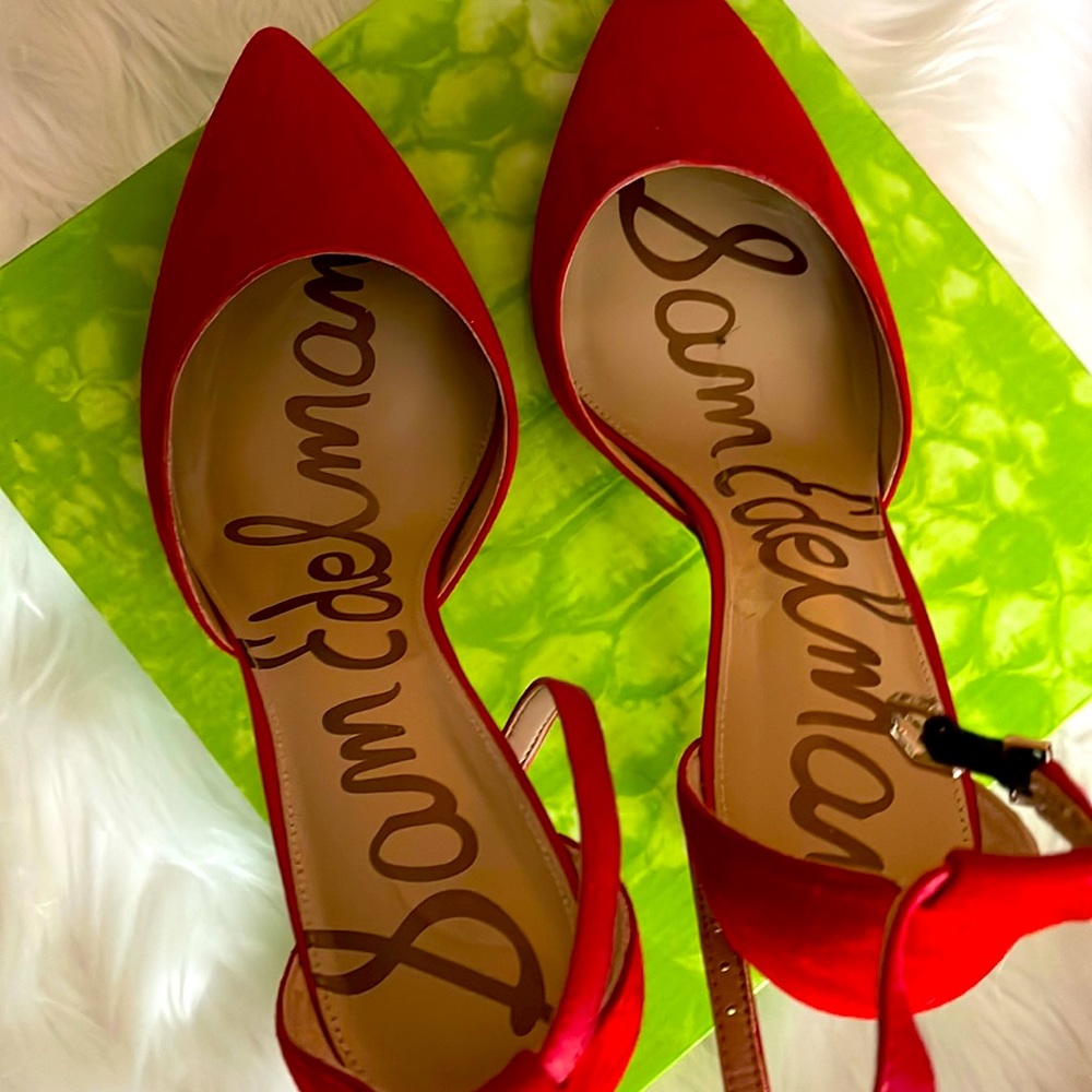 Red suede pumps